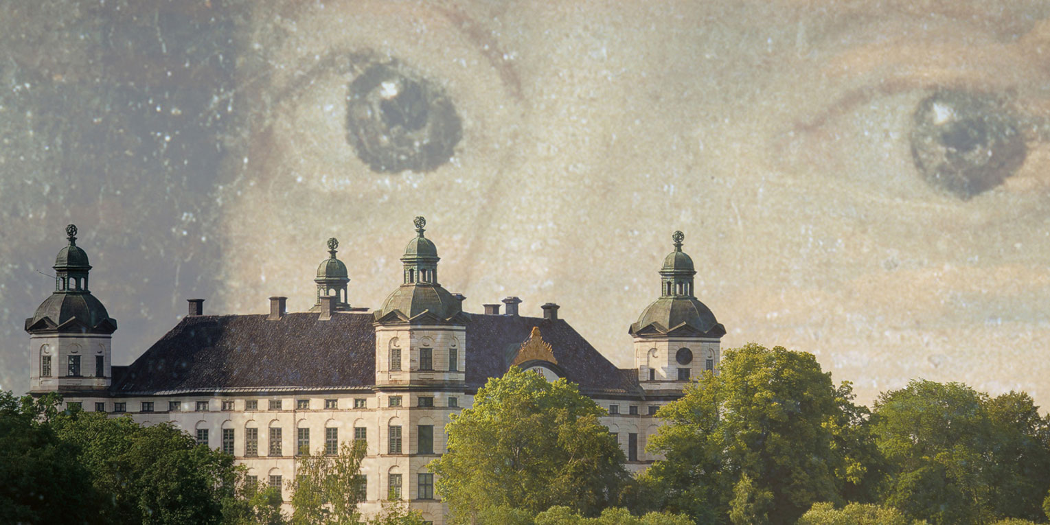 A view of the castle with a spooky face blended into the image.
