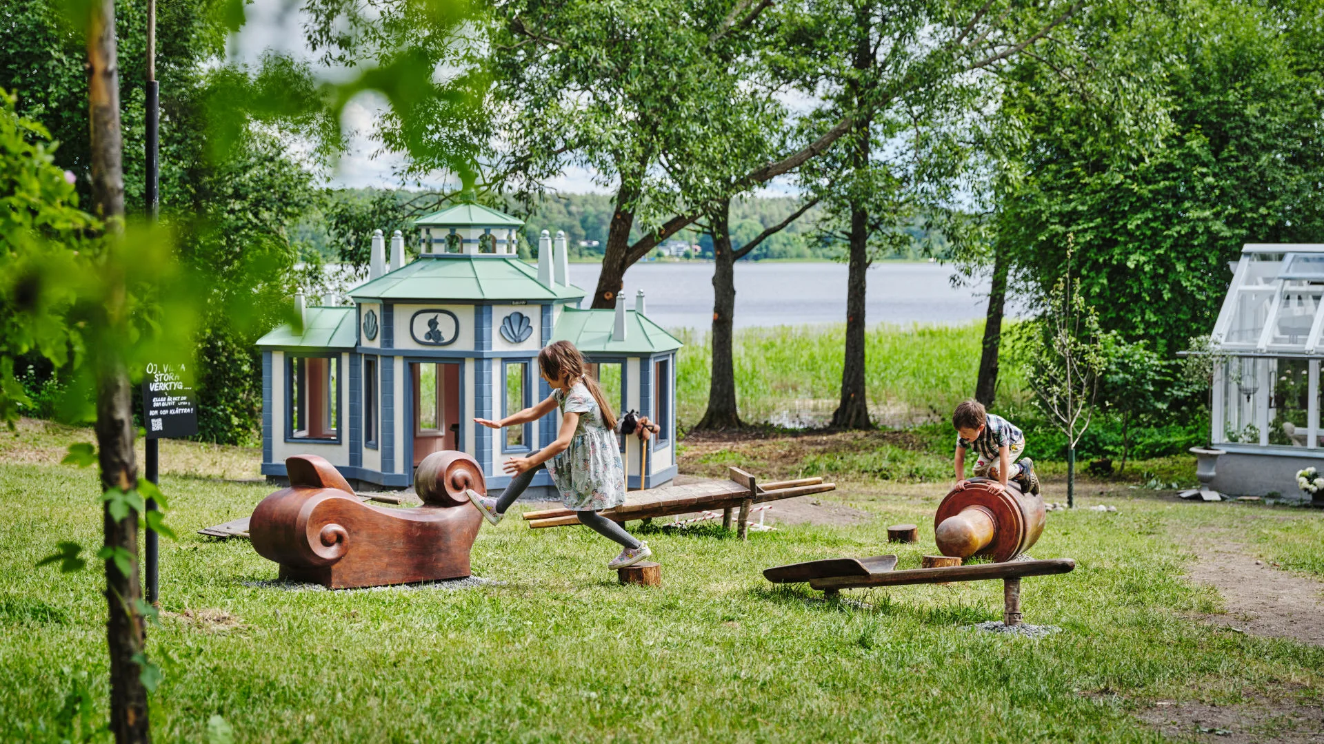 Two children playing in the Paradise Playground.